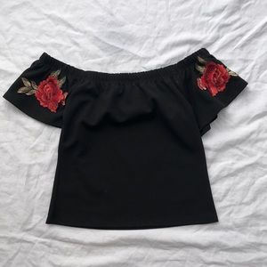Black off the shoulder crop top with floral sleeve